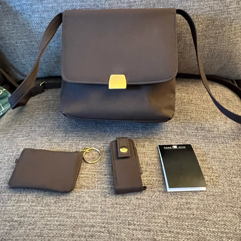 🎉HP🎉OKPTA Brown Purse with Gold Snap Closure. Multiple pockets. 24” strap.